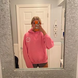 Pink smiley “spread the love” hoodie